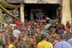 A Bangladesh Air Force training jet crashes into a school in Dhaka and kills at least 20